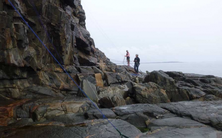 high schoolers rock climb in maine